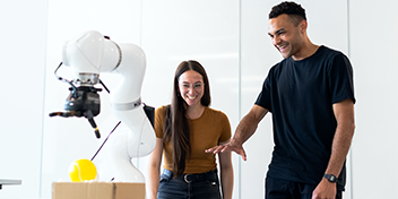 Engineers discussing a model